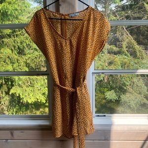 Cute mustard romper, worn only once or twice!